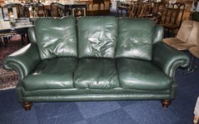 An Expensive and Good Quality Green Leather 3 Seater Sofa With 3 Removable Soft Leather Cushions.