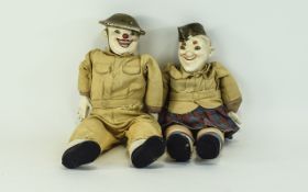 Laurel and Hardy 1940's Pot and Cloth Dolls, Both Figures In Military Uniform. 12.25 Inches Tall.