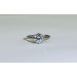 18ct White Gold Set Single Stone Diamond Ring, The Round Brilliant Cut Diamond of Good Colour.