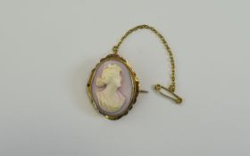 A Vintage - Nice Quality 9ct Gold Set Oval Shaped Cameo, with Attached 9ct Gold Safety Chain.