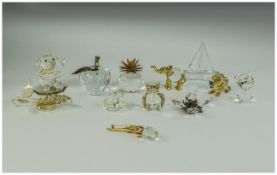 Collection of Crystal Ornaments .including butterfkly, apple, elephant, yacht, swan etc