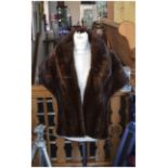 Dark Brown Mink Stole, shawl collar running down to the front hem, slit pockets to front panels;