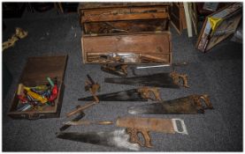 Collection Of Carpenters Tools Including old saws, two cases and assorted tools.