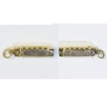 A Bespoke 9ct Gold Charm In The Form of a Miniature Harmonica which plays.