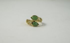 Green Jade Crossover Ring, openwork shoulders to the 14ct gold vermeil and silver shank, holding two