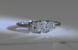 14ct White Gold Set 3 Stone Diamond Ring. The Princes Cut Diamonds of Good Colour. Marked 14ct.