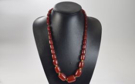 Toffee Amber Reconstituted Necklace, graduated barrel beads of reconstituted amber; approx.
