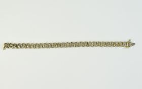 10CT Gold Diamond Cluster Line Bracelet. Hallmarked 10ct gold fancy bracelet set with