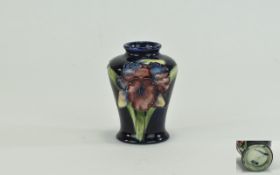 Moorcroft Small Vase ' Orchids ' Pattern on Blue Ground. c.1940's. 3.75 Inches High. Has been