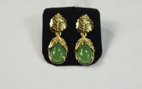 Green Jade Drop Earrings, pear cut cabochons of green jade set in leaf embellished mounts, suspended