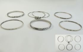 Mixed Lot of 6 Silver Sleigh Bangles, engine turned, bright cut decoration.