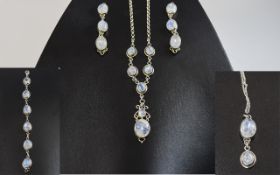 Rainbow Moonstone Collection comprising Y-shaped pendant necklace, oval stone set line bracelet,