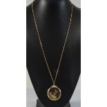 Edwardian Circular Shaped Double Sided 18ct Gold Locket and Attached Chain. Marked 750.