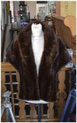 Dark Brown Mink Stole, shawl collar running down to the front hem, slit pockets to front panels;