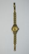 Dominant 15 Jewels 9ct Gold Cased Mechanical Ladies Vintage Wristwatch with Attached 12ct Gold