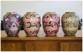 Collection of Four Large Enamelled Brass Vases floral decoration in pastel tones, Height 17 inches.
