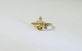 Citrine Honey Bee Ring, the body of the bee comprising a 1ct pear cut citrine with a round cut white