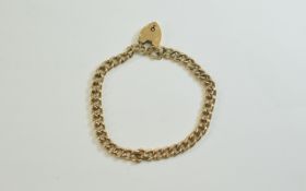 A 9ct Gold Curb Bracelet with Padlock. Fully Hallmarked and In Excellent Condition, No Wear. 8.