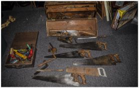 Collection Of Carpenters Tools Including old saws, two cases and assorted tools.