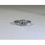 Ladies 18ct White Gold Set Baguette and Brilliant Cut Diamond Ring.