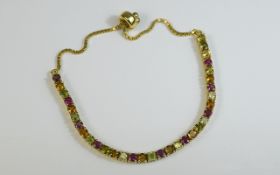 Multi Tourmaline Tennis Bracelet with adjustable fastener; deep pink, amber yellow and apple green