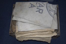 Crate Containing a Quantity of Hessian Sacks.