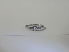 9 Carat White Gold Dress Ring set with 5 faceted clear stones. Ring size N.