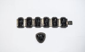 Mexican 1930's Solid Silver Bracelet, Set with Six Black Obsidian Masquette Carvings of Inca Masks.