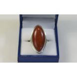 Red Jade Solitaire Ring, a marquise shap