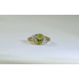 9 Carat Gold Dress Ring central peridot,