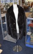 Dark Brown Ladies Mink Jacket. Label to