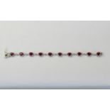 Ruby and White Topaz Bracelet, ten oval