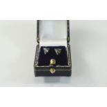 Pair of 9 Carat Gold Stud Earrings. Each