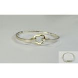 Silver Bangle with heart shaped gilt fas