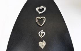 Collection of 4 Silver Heart Shaped Pend