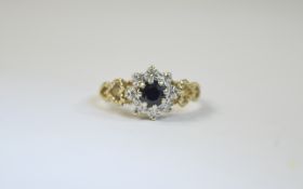 9ct Gold Set Sapphire and Diamond Cluster Ring. Flower head Setting.