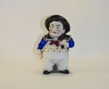 A 19th Century Hand Painted Figural Ceramic Tobacco Jar In The Form of a Large Sailor.