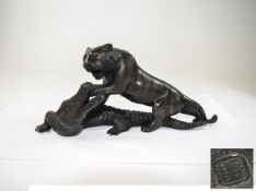 A Quality Japanese Early 20th Century Signed Bronze Sculpture of a Tiger Attacking an Alligator.