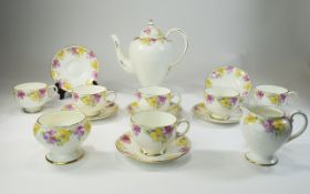 Paragon Fine China Tea Set. Comprising tea pot, sugar bowl, milk jug, 6 cups and saucers, yellow and
