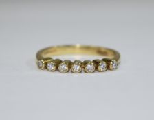 18ct Gold Set Seven Stone Diamond Ring, The Diamonds of Good Colour and Clarity.