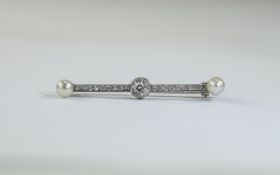 Ladies Art Deco Diamond & Pearl Bar Brooch; Central round cut diamond approximately .5 cts.
