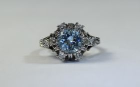 Ladies Platinum Diamond & Aquamarine Ring. Ladies ring with central modern brilliant cut