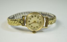 Ladies Rolex Tudor Royal 9ct Gold Ladies Cocktail Watch. Silvered dial with gold hands and numerals.