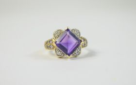 9ct Gold Diamond & Amethyst Dress Ring Central Square Cut Amethyst set between 4 diamond chips to