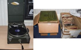 Mayfair Deluxe Model Portable Gramophone together with a quantity of records to include a box of