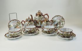 Japanese Very Fine Porcelain ( 13 ) Piece Tea Service, Highly Decorated with Painted Scenes of
