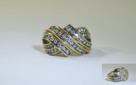 9ct Gold Diamond Cluster Ring. Channel set round brilliant cut diamonds.