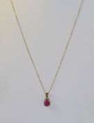 9ct Gold Set Ruby Pendant with Attached 9ct Gold Chain. Fully Hallmarked.
