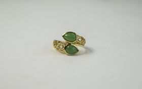 Green Jade Crossover Ring, openwork shoulders to the 14ct gold vermeil and silver shank,