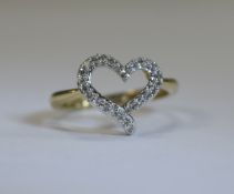 Ladies 9ct Gold Set Heart Shaped Diamond Ring, Marked 9ct. Small Diamonds but Good Colour.